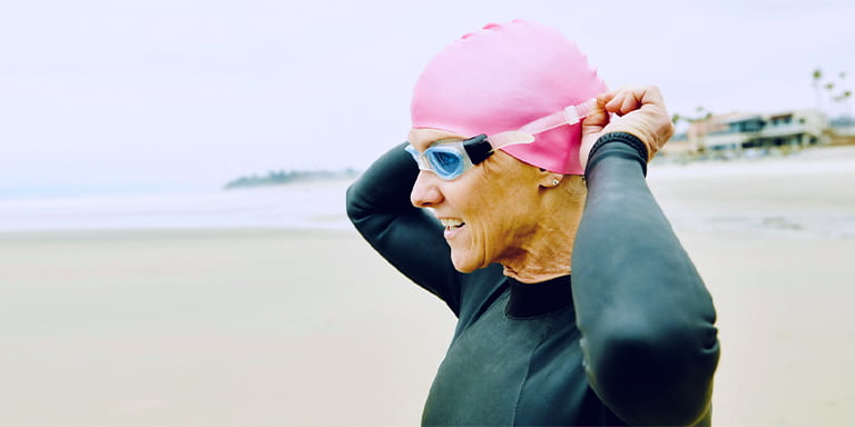 Retirement is just a word image of woman wearing googles and a swimming cap