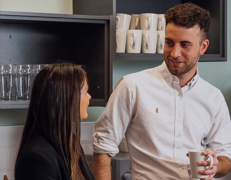 Current opportunities image of a group of people talking on a coffee break