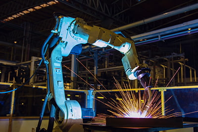 Customised solutions image of a robot arm weilding