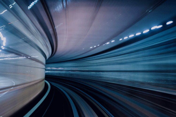 Mergers and acquisitions image of a train tunnel