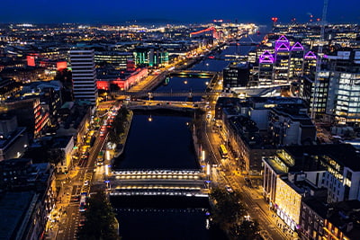 Sectoral expertise image of the Liffey at night from a drone
