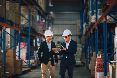 Unique and actionable insights image of two people working on a tablet