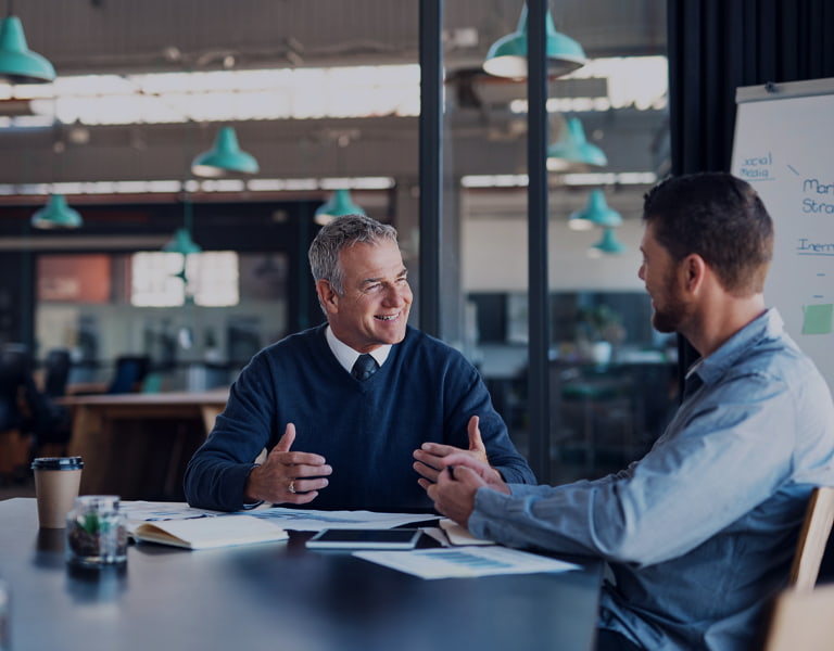 Business sucession plannig image of a father and son planning their day