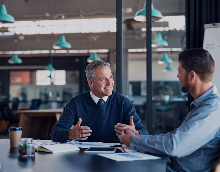 Business sucession image of a two people talking