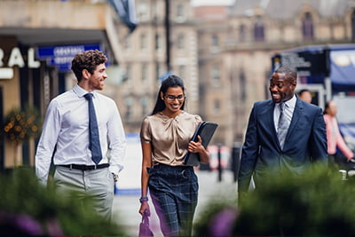Professionals walking down a high street