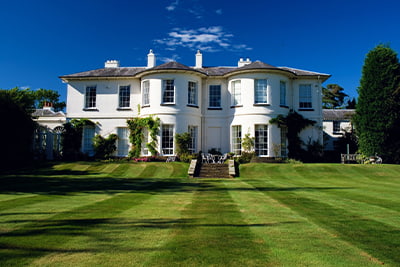 Investing, manor house and garden
