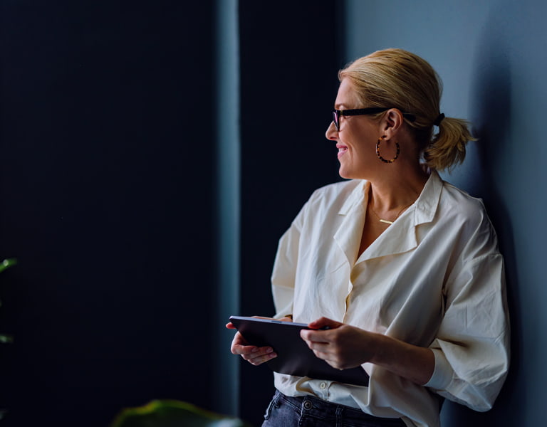 Investing image of a smiling person