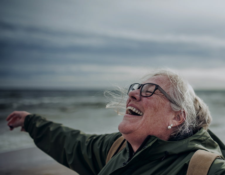 Manage a retiremetn fund image of a person on a beach