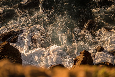 Sustainable investing image of a sea cliff