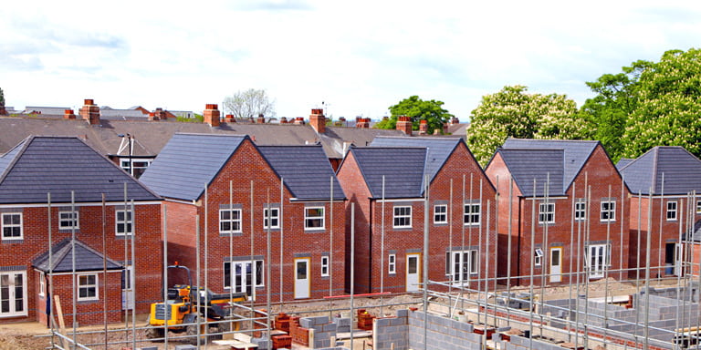 Getting Ireland Building again Discussion with Ireland's Minister for Housing image of houses under construction