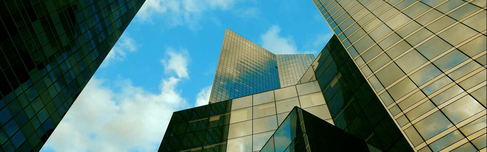 Corporate image of a city skyline against a blue sky