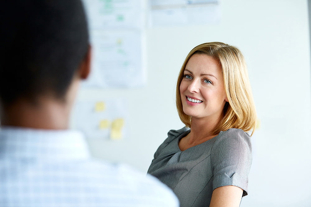 Investment advisory service image of a smiling person