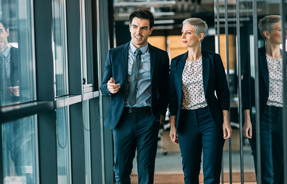 business people walking and talking