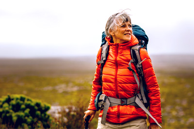 Control your Financial Future image of a woman hiking