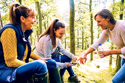 Financial plan image of people sitting in a forest