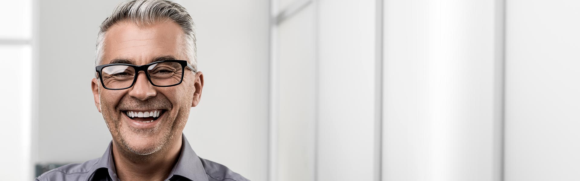 Davy wealth management image of man in glasses