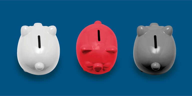 Piggy banks against a navy background