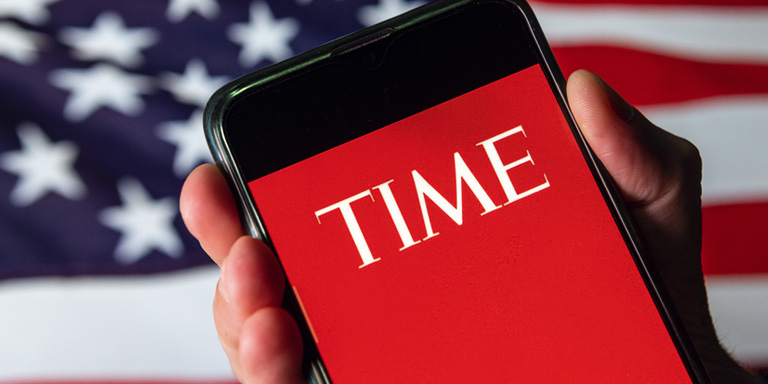 Mobile phone displaying TIME magazine cover