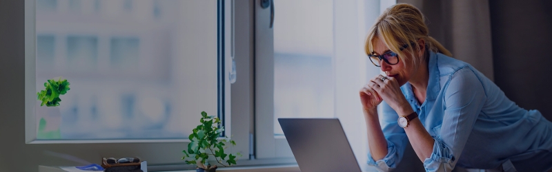 woman reading laptop
