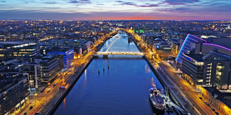 Budget 2026 Dublin skyline at night over the river Liffey