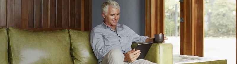 Man reading iPad