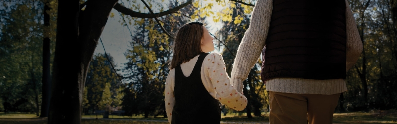 Grandchild and Grandfather walking