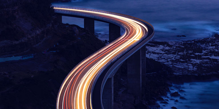 Image of lights from cars on a bridge