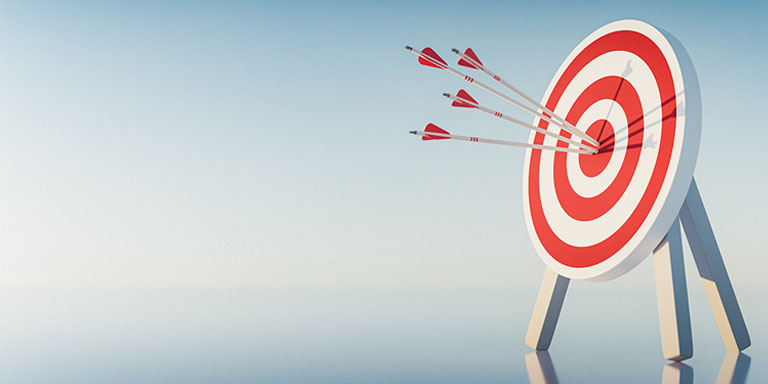 Financial market forecasting is difficult but not futile. image of target with arrows on blue background