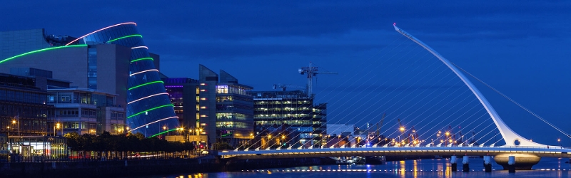 Image of the Convention Centre Dublin and the Samuel Beckett bridge at night.