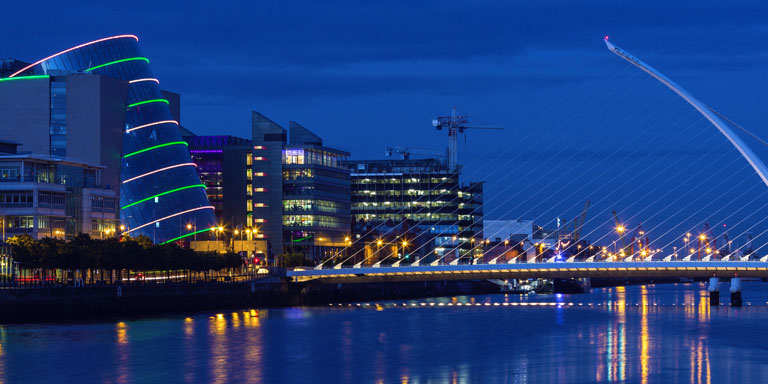 Image of the Convention Centre Dublin and the Samuel Beckett bridge at night.