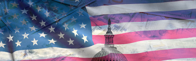 American flag with US government building