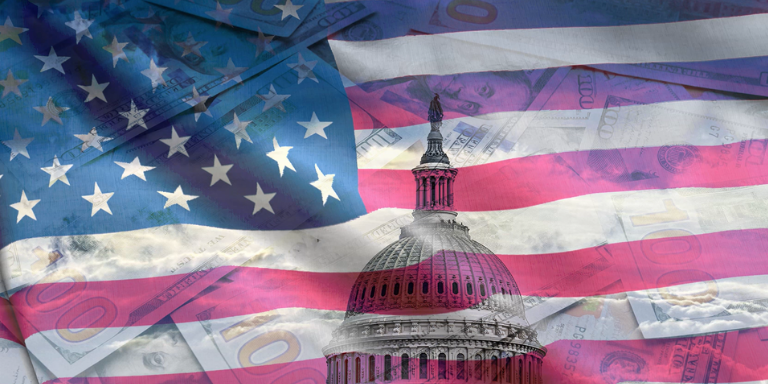 American flag with US government building