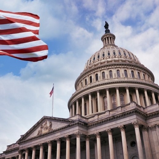 US Congress building and American flag