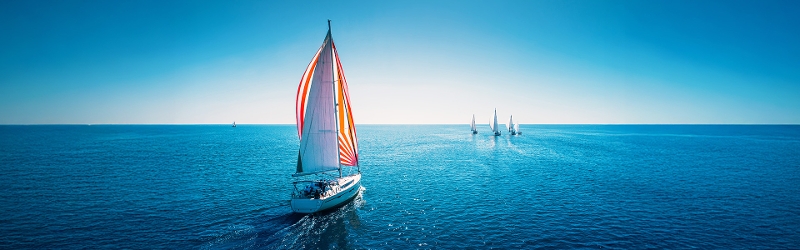 Image of boat sailing out to sea