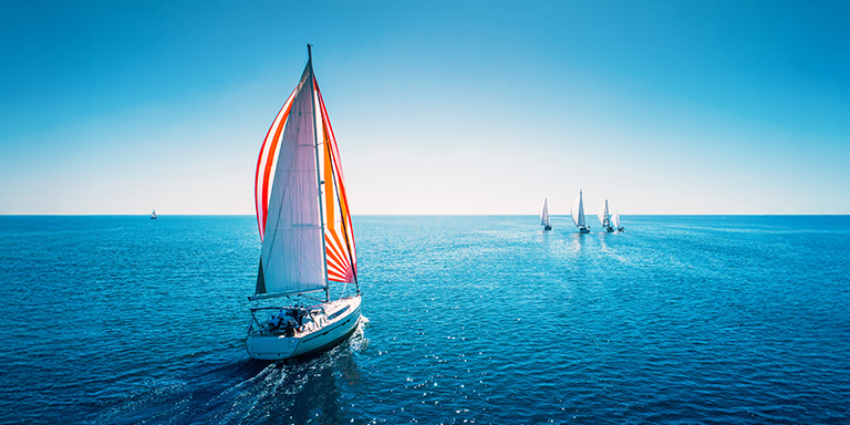 Image of boat sailing out to sea