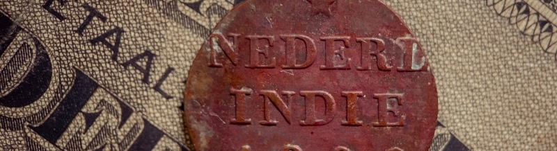 Indian coin over dollar