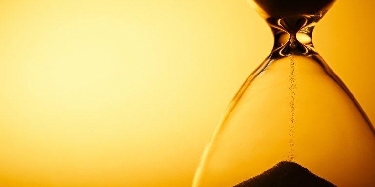 Hourglass pouring sand