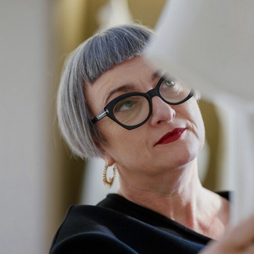 Mature professional woman looking at a document