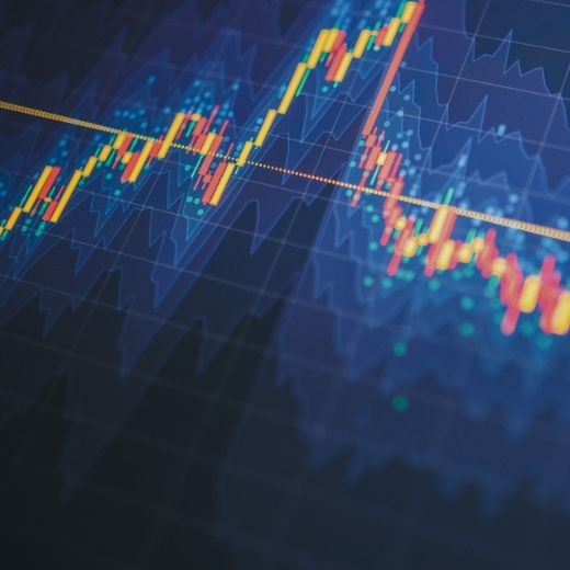 Image shows a financial chart moving up and down