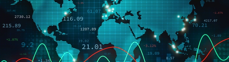 Map of world with wavering chart lines depicting fluctuating markets