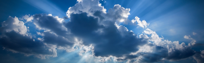 Glimmers of sunlight through the storm clouds