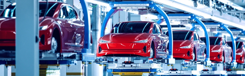 Cars being made in a factory