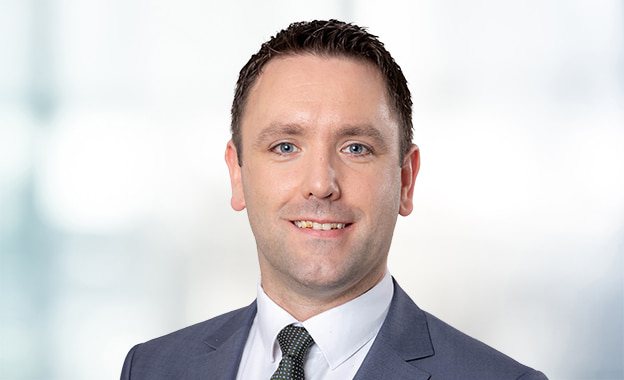 Portrait of Adrian Bushell, smiling